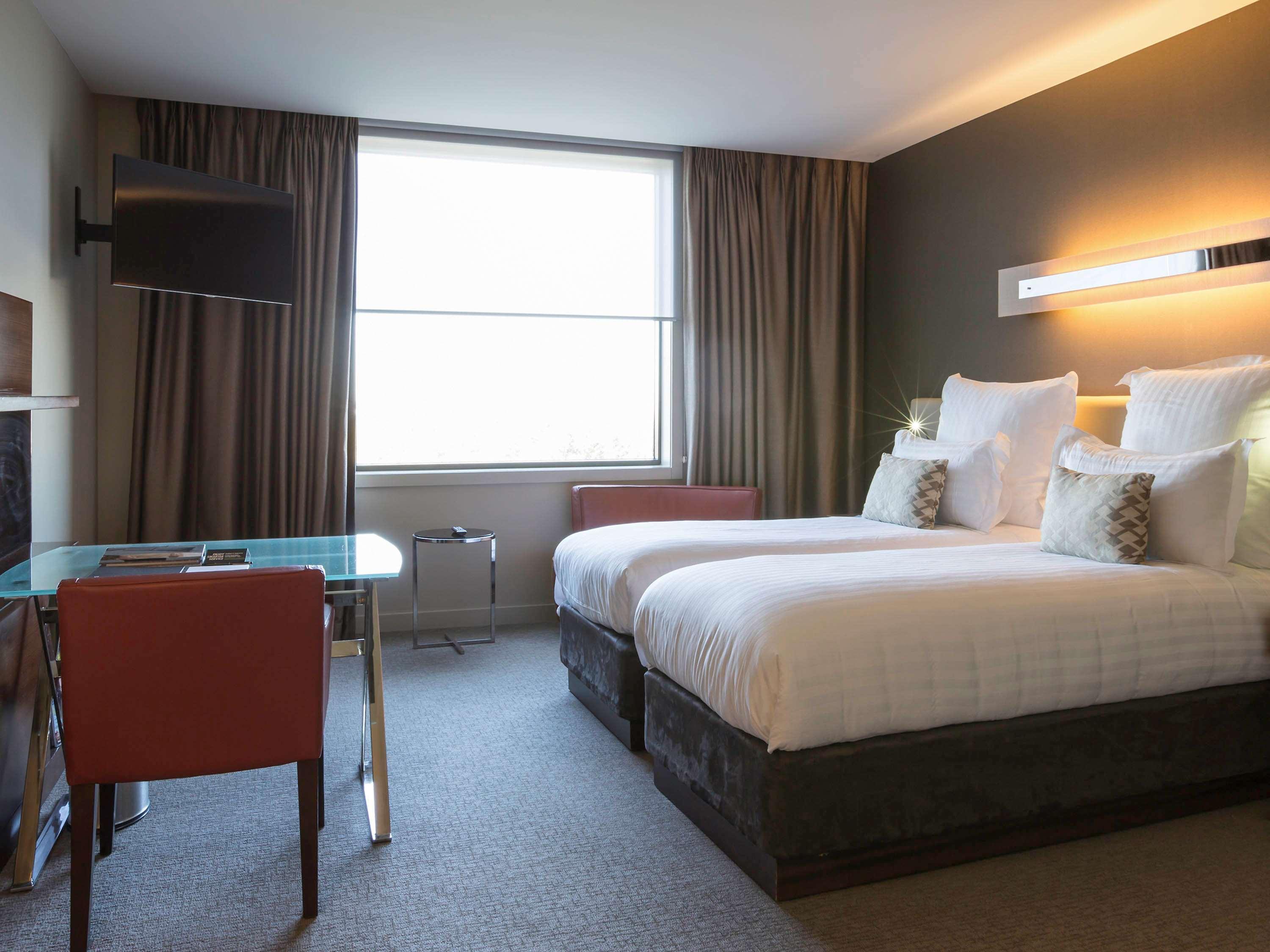 Pullman Sydney Olympic Park Hotel Bagian luar foto A room at the hotel