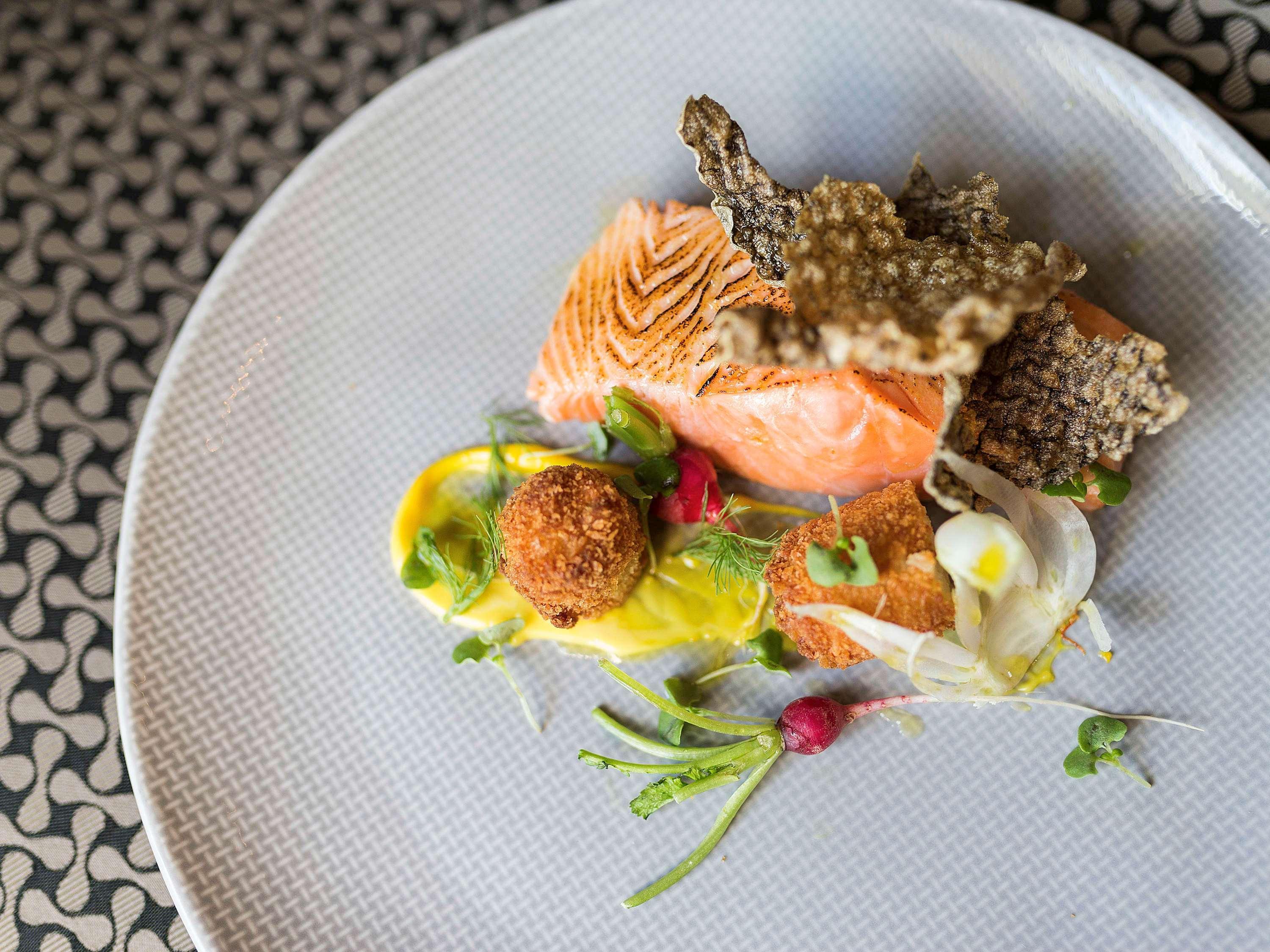 Pullman Sydney Olympic Park Hotel Bagian luar foto Salmon prepared with a sauce of white wine, mustard, and cream