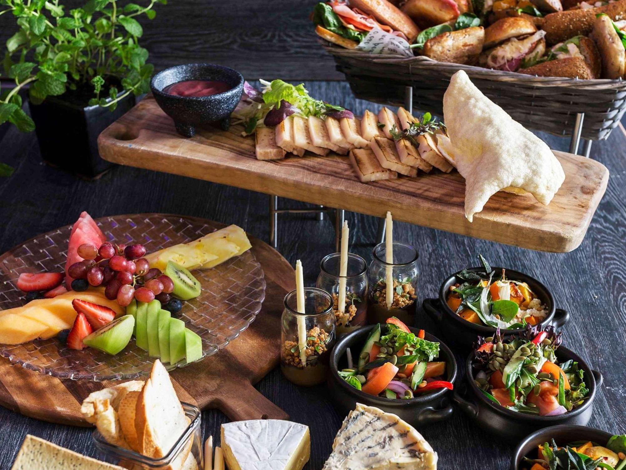 Pullman Sydney Olympic Park Hotel Bagian luar foto A selection of tapas