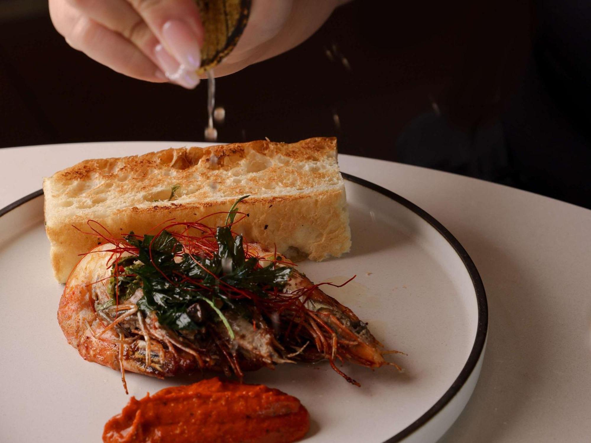 Pullman Sydney Olympic Park Hotel Bagian luar foto A prawn and bread dish